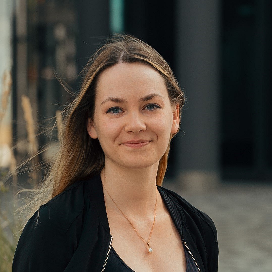 A professional portait headshot of Sonja Schäfer wearing a black jacket and necklace.