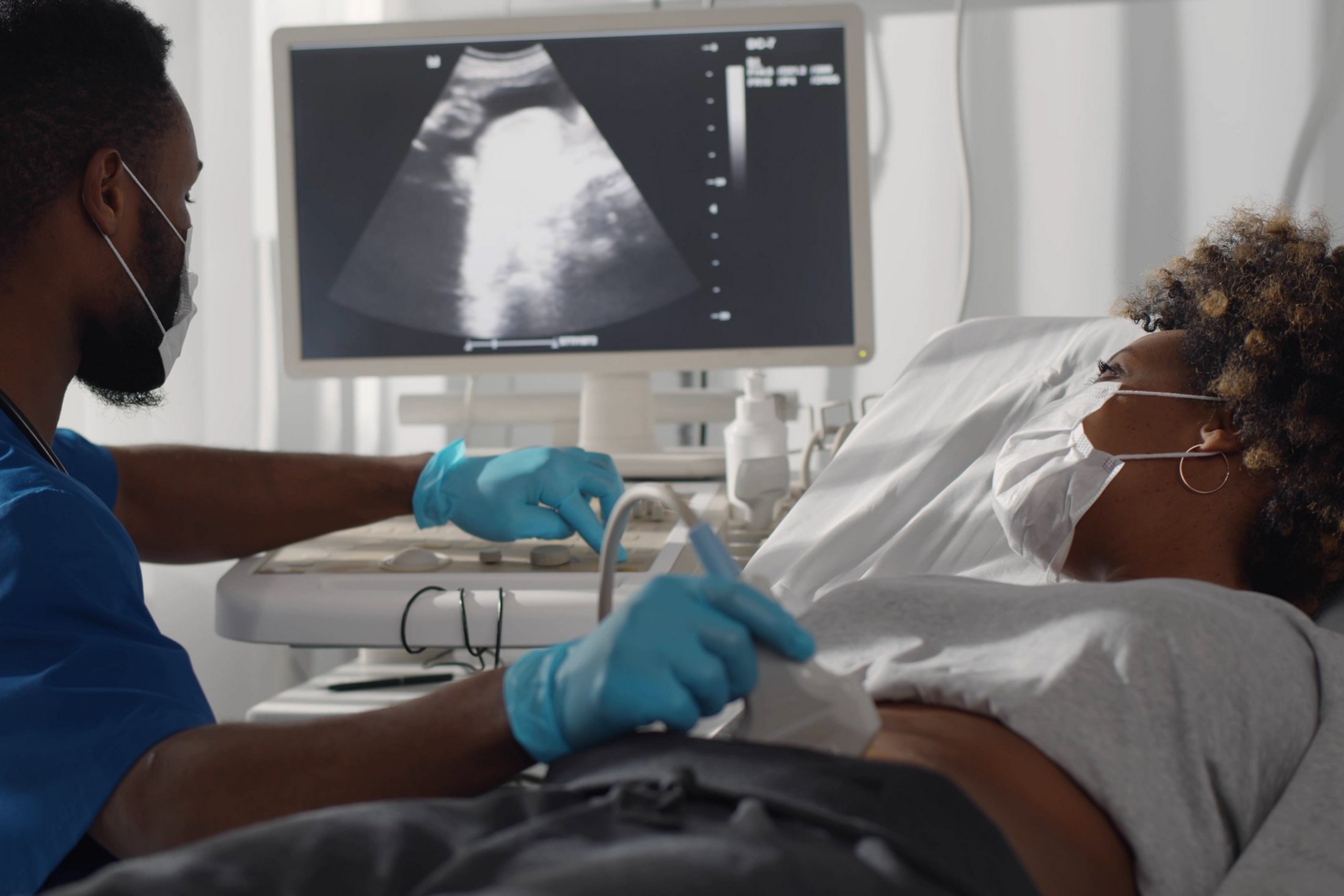 Pregnant woman having a prenatal ultrasound scan.